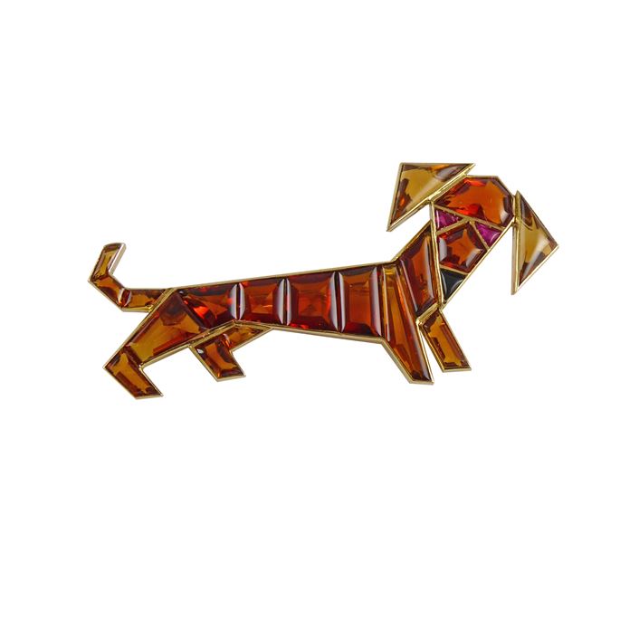 Mid-20th century citrine and gem set dog brooch by Cartier c.1950, modelled as a dachshund, the characterful geometric design set with buff-top calibre cut gemstones, | MasterArt